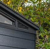 Keter Cortina 9x7 Ft All-Weather Storage Shed with Skylight, Window, Built-in Ventilation, Customizable Walls, & Lockable Double Doors, Graphite